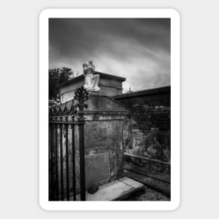 A Fence A Wall and A Headless Angel In Black and White Sticker